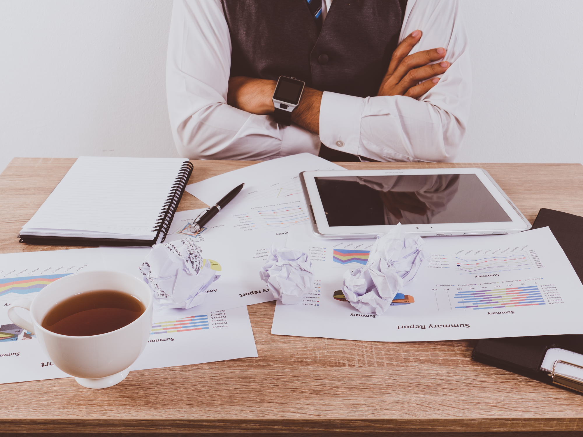 Hands of Businessman working with Data Charts