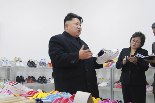 North Korean leader Kim provides field guidance to the Ryuwon Shoes Factory in this undated photo released by North Korea's KCNA in Pyongyang