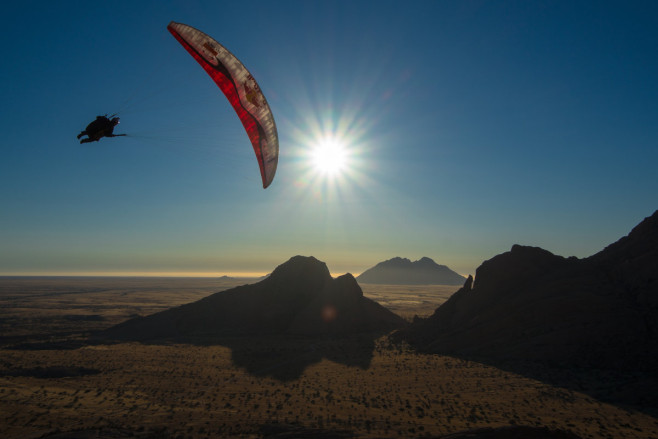 bulgarian-pilot-veso-ovcharov-paraglider-flying-in-the-namib-desert-namibia