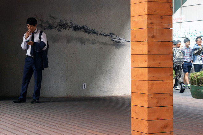 Asias-social-and-political-issues-through-the-surrealistic-eyes-of-Pejac.6__880
