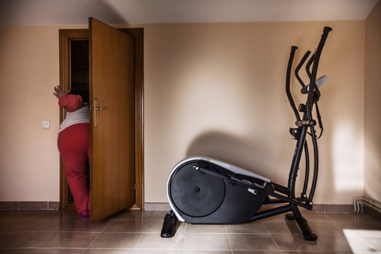 Barcelona, Spain - April 2012 Sandra in the attic of her house in Barcelona where she keeps various exercise machines, seldom used. Barcellona, Spagna - Aprile 2012 Sandra nella soffitta di casa sua a Barcellona dove tiene diverse macchine per esercizi, raramente usati.