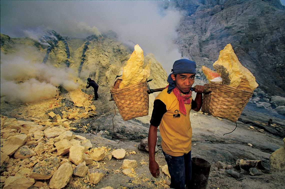 Another precious Indonesian commodity, sulfur, is still mined from active volcanic vents in Ijen Volcano, East Java, Indonesia.